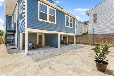View of backyard and covered patio