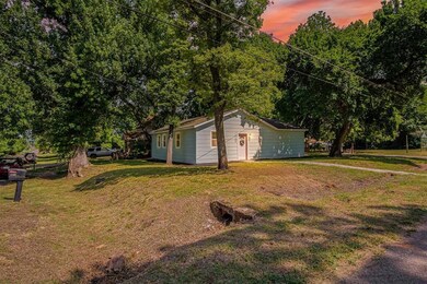 Yard at dusk with a lawn