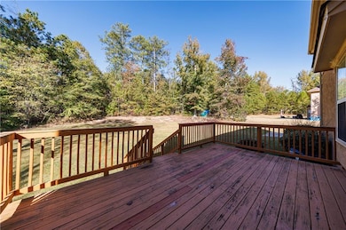 Deck featuring a yard