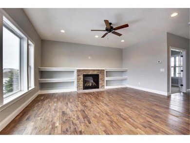 Spacious great-room with gas fireplace and built-i