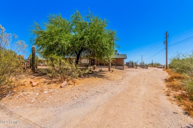 Additional driveway to side of home.