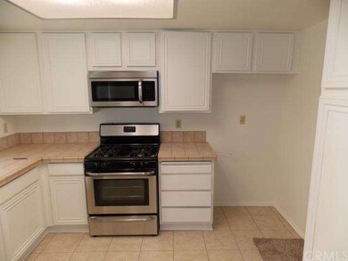 Open kitchen with stainless appliances