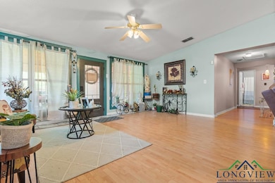 Interior space featuring baseboards, visible vents