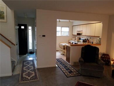 FRONT HALLWAY ENTRANCE AND NEXT TO THE FIRST FLOOR