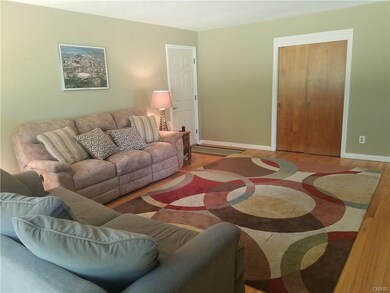 Another view of the living room - door to the righ