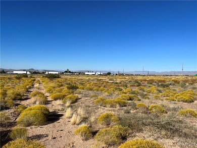 Looking NNE on 000 N Apache Rd from Near SE Proper