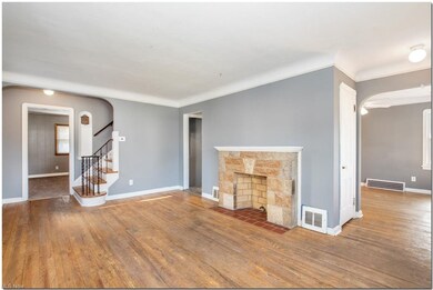 Living Room opens to Dining Room