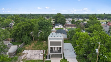 Aerial view showcasing lot and surroundings