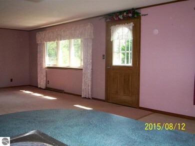Bay Window in living room open to dining area with