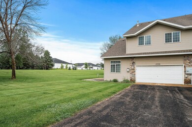 Gorgeous corner unit townhome with extended driveway and huge yard right outside front door