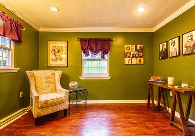 Reading nook area features recessed lighting and a