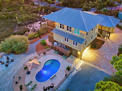 Beautifully landscaped w/paver driveway