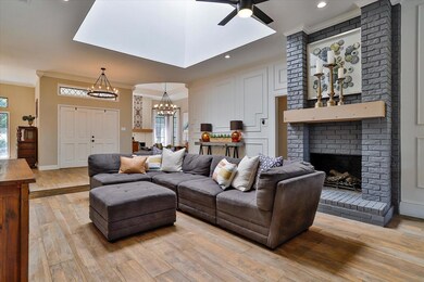 Living room featuring light hardwood / wood-style 