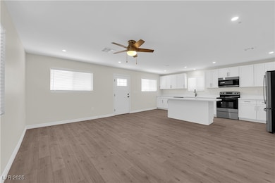 Kitchen featuring stainless steel appliances, open