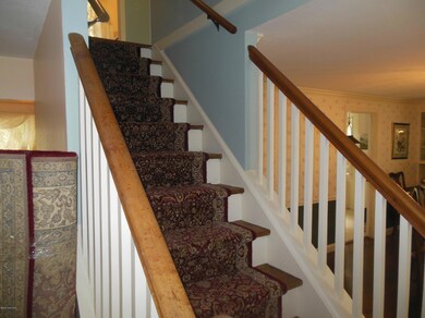 Stair up to 3 BR + bath