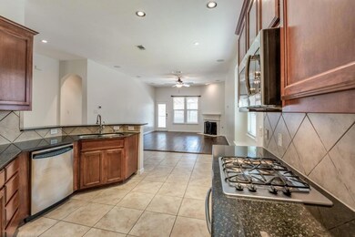 Kitchen with sink, appliances with stainless steel