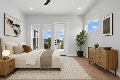 Bedroom with light wood finished floors, access to exterior, ceiling fan, and recessed lighting