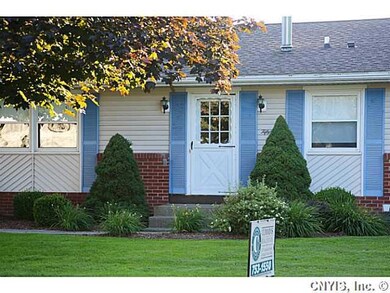 Exterior Front Professional landscaping is easily maintained and very welcoming!