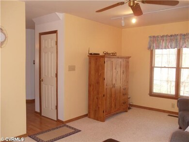 Den/Family/Great Room - Carpeted Den features trac