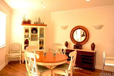Spacious dining area adjacent to living room.
