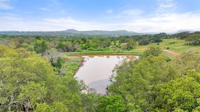Drone / aerial view of a water and mountain view 