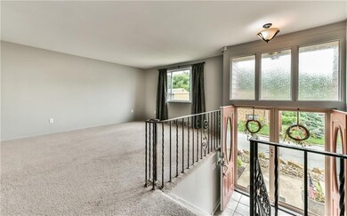 Spacious living room with lots of natural lighting