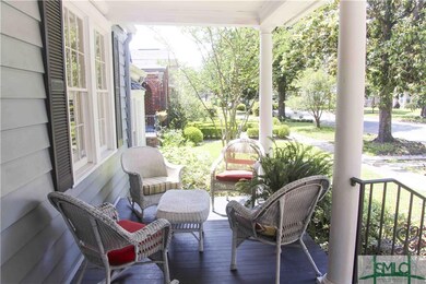 Welcoming front porch with swing.