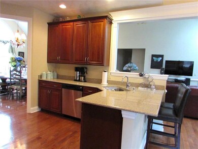 A Breakfast Bar, Stainless Steel Appliances & Quar
