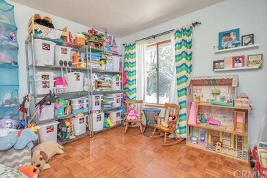 3rd bedroom is being used as a play room