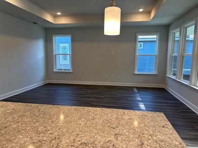 Spare room featuring a wealth of natural light, da