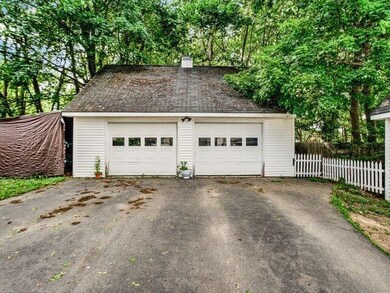 Great garage with tons of storage above.