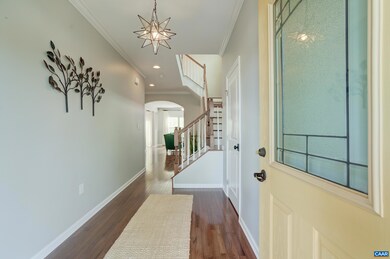 Hardwood floors and neutral paint throughout the m