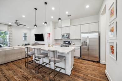 An open concept kitchen was recently remodeled wit