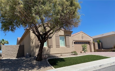 View of front facade featuring an attached garage,