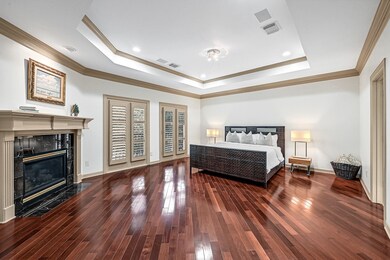Gorgeous Master bedroom with gas fireplace and dou