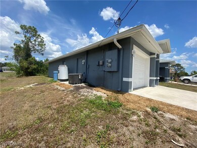 View of home's exterior featuring an attached gara