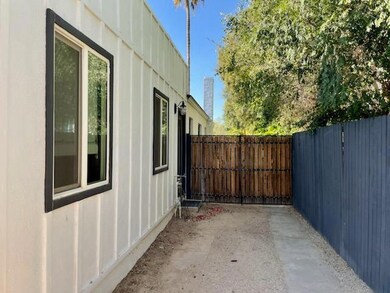 Side gate access to garage
