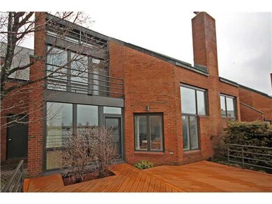 Exterior Back Rear view shows 3 waterfront balconi