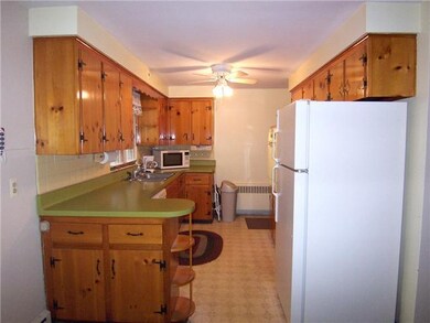 Kitchen. ANOTHER VIEW OF THE KITCHEN.