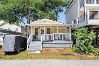 View of front facade featuring a porch and stairwa