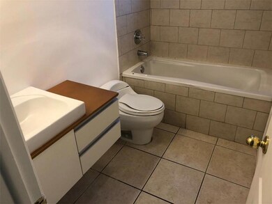 Newer vanity and toilet,  soaking tub perfect for