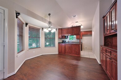 Nice Cabinetry and Bow Window in the Dining Area.
