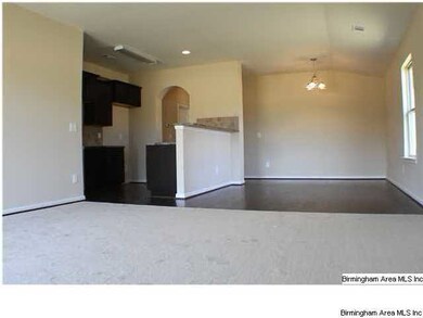 GREAT ROOM THAT ADJOINS THE DINING ROOM