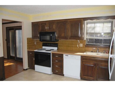 Kitchen with pantry and access to dining room