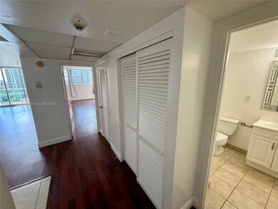 Foyer with half bath and two closets