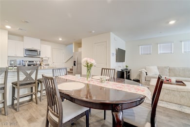 Dining space featuring light wood-type flooring