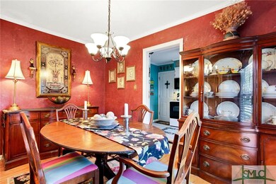 Dining room looking into kitchen.