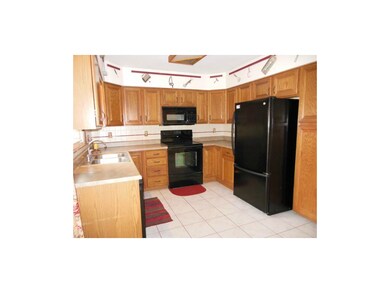 Newer appliances all stay, easy-clean tile floor, 