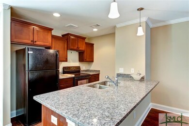 Kitchen-*ACTUAL UNIT NOT DEPICTED. PHOTOS ARE FROM