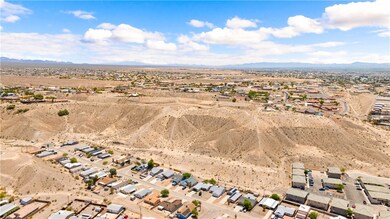 Aerial view of property and surrounding area with